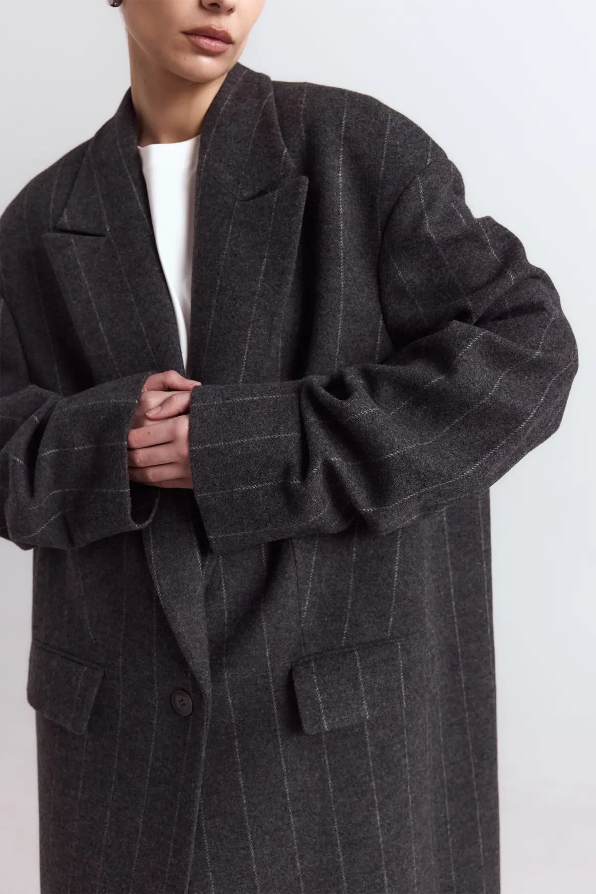 Straight-cut coat with gathered sleeves